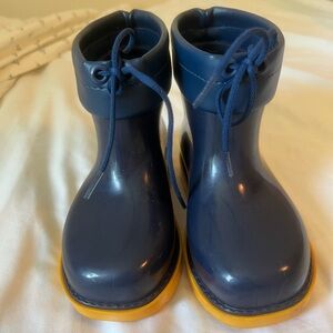 Mini Melissa rain boots.